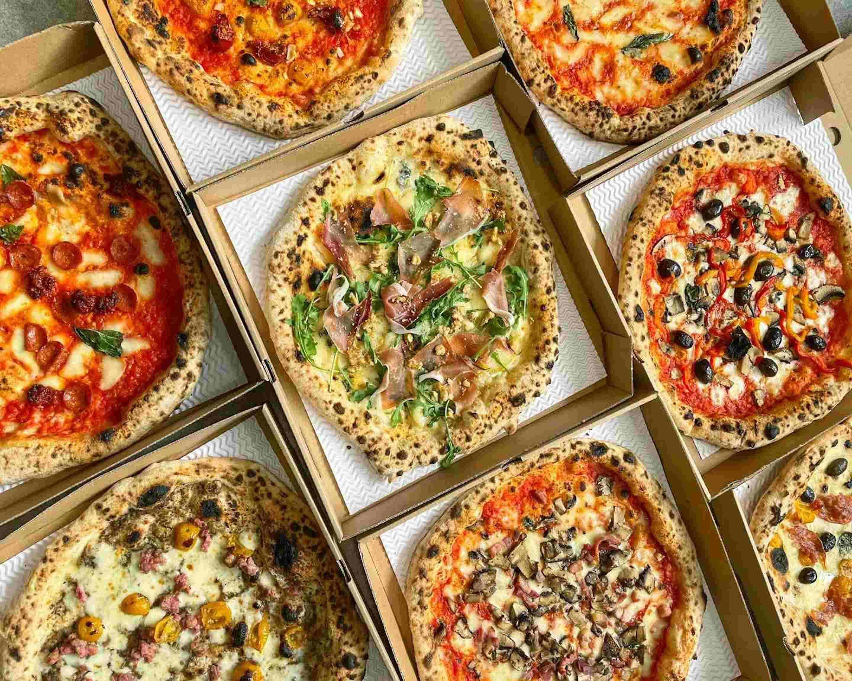 Crust Napoli — Hand-stretched Napoli-style, leopard-spotted crust.