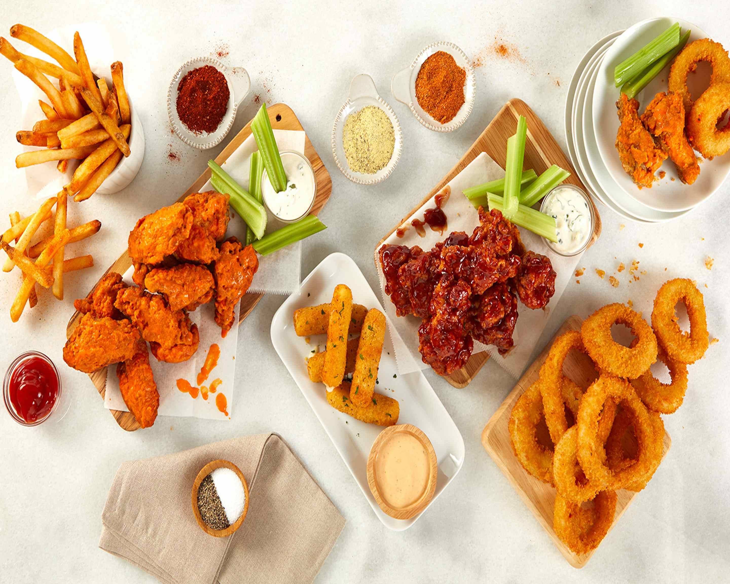 Wings & Things — Twelve sauces, double-fried, late-night ready.